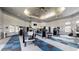 Spacious gym with ample workout equipment, mirrored walls, and ceiling fans at 13839 Fairway Island Dr # 1116, Orlando, FL 32837