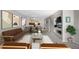 Spacious living room with open layout to kitchen and dining area, neutral decor and natural light at 13839 Fairway Island Dr # 1116, Orlando, FL 32837