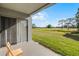View from the patio overlooking a lush golf course and blue skies at 13839 Fairway Island Dr # 1116, Orlando, FL 32837