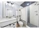 Beautiful bathroom with modern fixtures, white vanity, and tiled walk-in shower at 1421 N Hampton Ave, Orlando, FL 32803