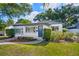 Well-maintained single-story home with a tidy front lawn and inviting entry at 1421 N Hampton Ave, Orlando, FL 32803