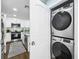 Conveniently located, this laundry area features stacked front loading machines adjacent to the kitchen at 1421 N Hampton Ave, Orlando, FL 32803