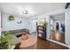 Spacious living room boasting hardwood floors and an open layout with natural light at 1421 N Hampton Ave, Orlando, FL 32803