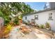 Outdoor patio showcasing a cozy seating area surrounded by lush greenery, perfect for relaxation at 1421 N Hampton Ave, Orlando, FL 32803