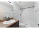 Bathroom features vanity and modern shower with dark accents and ample space at 14878 Se 32Nd Ter, Summerfield, FL 34491
