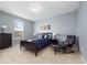 Comfortable bedroom with natural light and neutral color palette at 15242 Heron Hideaway Cir, Winter Garden, FL 34787