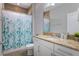 Full bathroom with shower/tub combination and granite vanity top at 15443 Sugarcup Ct, Orlando, FL 32828