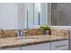 Close up on bathroom sink and granite countertop with stylish faucet at 15443 Sugarcup Ct, Orlando, FL 32828