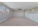Large carpeted room with ceiling fan and natural lighting at 15443 Sugarcup Ct, Orlando, FL 32828