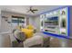 Modern living room with decorative entertainment center and comfortable sectional sofa at 15443 Sugarcup Ct, Orlando, FL 32828