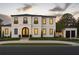 Stunning two-story home with a modern design, beautiful landscaping, and a grand entrance at 185 Sylvan Blvd, Winter Park, FL 32789