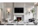 Elegant living room features a fireplace, stylish decor, and comfortable seating at 185 Sylvan Blvd, Winter Park, FL 32789