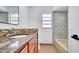Bathroom vanity featuring a stylish mosaic backsplash, granite counters, and modern fixtures at 1965 Greenview Dr, Deltona, FL 32725