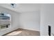 Bright bedroom with tile flooring and a modern ceiling fan at 1965 Greenview Dr, Deltona, FL 32725
