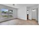 Bright bedroom with neutral paint, lots of natural light, and updated flooring at 1965 Greenview Dr, Deltona, FL 32725