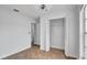 Bright bedroom featuring a modern ceiling fan, closet, fresh paint, and tiled floors at 1965 Greenview Dr, Deltona, FL 32725