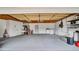 The garage is spacious and has sealed concrete floors, with a utility sink, washer, and dryer at 1965 Greenview Dr, Deltona, FL 32725