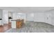 Open concept kitchen with stainless appliances and modern island at 1965 Greenview Dr, Deltona, FL 32725
