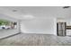 Bright kitchen features stainless steel appliances and wood-look flooring at 1965 Greenview Dr, Deltona, FL 32725