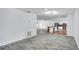 Open-concept living space with kitchen island and views of the rest of the house at 1965 Greenview Dr, Deltona, FL 32725