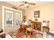 Cozy dining area with patio access, perfect for indoor and outdoor entertaining and natural light at 2102 Urbana Ave, Deltona, FL 32725