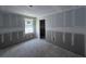 Spacious room features light from the window and unfinished walls ready to be transformed into the perfect space at 22113 Amberbush Ct., Mount Dora, FL 32757