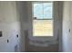 Room under construction featuring a bright window at 22113 Amberbush Ct., Mount Dora, FL 32757