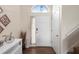 Inviting entryway featuring neutral tones, modern decor, and an abundance of natural light at 232 Oxford Rd, Davenport, FL 33896