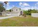 Beautiful two-story home with a spacious front yard, showcasing its well-maintained exterior at 232 Oxford Rd, Davenport, FL 33896