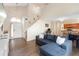 Spacious living room with tall ceilings, open floor plan, and seamless access to the kitchen at 232 Oxford Rd, Davenport, FL 33896