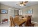 Formal dining room featuring a classic table set with a wooden table and chairs at 23203 Outback Ln, Eustis, FL 32736