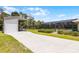 Property boasts a screened pool, boat storage and long driveway at 23203 Outback Ln, Eustis, FL 32736
