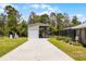 Boat storage in a well-maintained yard, ideal for outdoor enthusiasts with watercraft and equipment at 23203 Outback Ln, Eustis, FL 32736