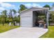 Boat storage in a well-maintained yard, ideal for outdoor enthusiasts with watercraft and equipment at 23203 Outback Ln, Eustis, FL 32736