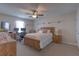 Inviting bedroom with neutral tones, natural lighting, and a comfortable bed at 269 Englenook Dr, Debary, FL 32713