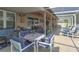 Well-furnished enclosed patio with comfortable seating and a bright, airy atmosphere at 269 Englenook Dr, Debary, FL 32713