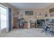 Bright office featuring tile flooring, multiple computer setups, and a large window at 269 Englenook Dr, Debary, FL 32713