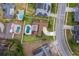 Aerial view of property with pool, patio, driveway, and lawn outlined in white at 275 Tollgate Trl, Longwood, FL 32750