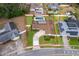 Aerial view of property showcasing pool, landscaping, and circular driveway, all within a defined property line at 275 Tollgate Trl, Longwood, FL 32750