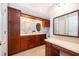 Beautiful bathroom features a double vanity, makeup counter, and stylish fixtures and finishes at 275 Tollgate Trl, Longwood, FL 32750