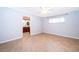 Bedroom boasts tiled floors and access to ensuite bathroom at 275 Tollgate Trl, Longwood, FL 32750