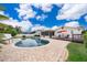 Private pool with brick patio, wood deck and screened enclosure offers a relaxing outdoor space at 275 Tollgate Trl, Longwood, FL 32750