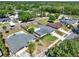 A beautiful aerial view of the homes in a quiet neighborhood with mature landscaping and in ground pools at 2811 Citron Dr, Longwood, FL 32779