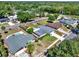 A beautiful aerial view of the homes in a quiet neighborhood with mature landscaping and in ground pools at 2811 Citron Dr, Longwood, FL 32779