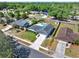A beautiful aerial view of the homes in a quiet neighborhood with mature landscaping and in ground pools at 2811 Citron Dr, Longwood, FL 32779