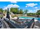 Backyard featuring a lovely patio, stylish outdoor furniture, lawn and swimming pool at 2811 Citron Dr, Longwood, FL 32779