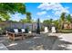 Backyard patio features outdoor furniture with nice landscaping and privacy fence at 2811 Citron Dr, Longwood, FL 32779