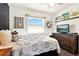 Stylish bedroom with dark wood floors, a neutral color scheme, and a comfortable bed with decorative pillows at 2811 Citron Dr, Longwood, FL 32779