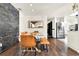 Modern dining room featuring stylish table and chairs, open to the kitchen with stainless steel appliances at 2811 Citron Dr, Longwood, FL 32779
