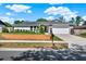 Charming single-story home boasts a well-manicured lawn, neutral paint scheme, and a two-car garage at 2811 Citron Dr, Longwood, FL 32779